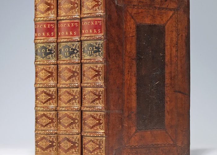 A rebacked copy of Locke's Works with bright gilt
