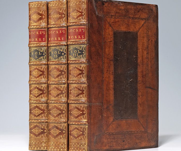 A rebacked copy of Locke's Works with bright gilt